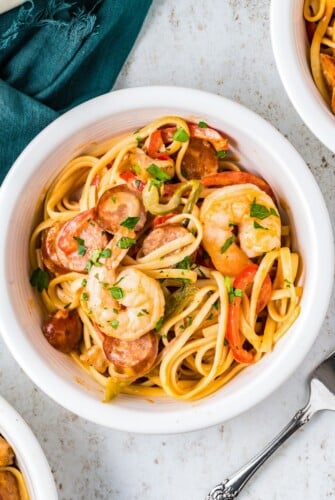 A bowl of Cajun Jambalaya Pasta with a fork.