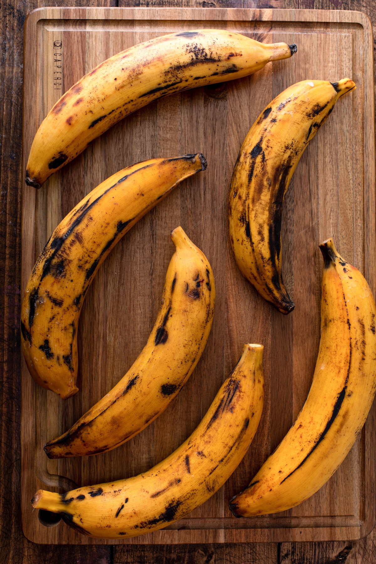 Plantains on a cutting board.