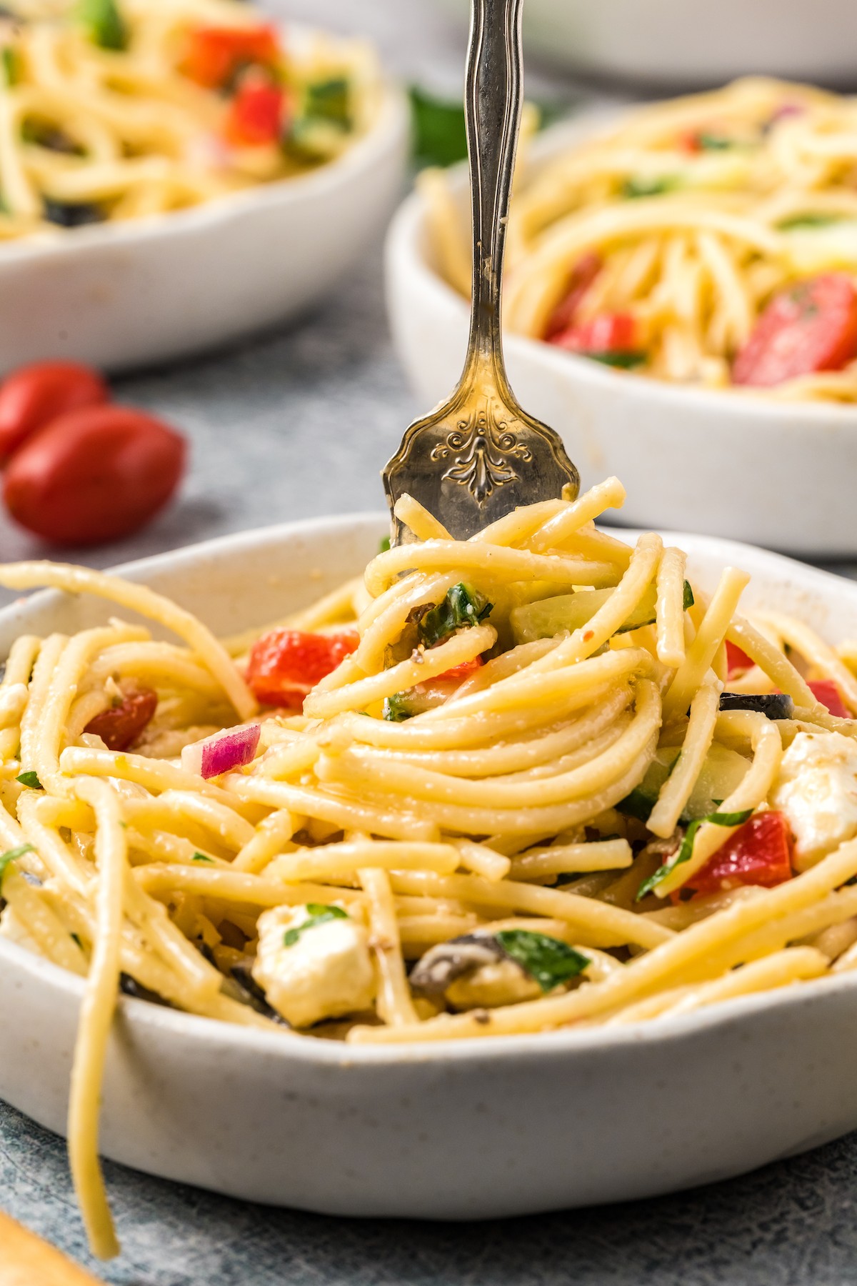Swirling pasta around a fork.