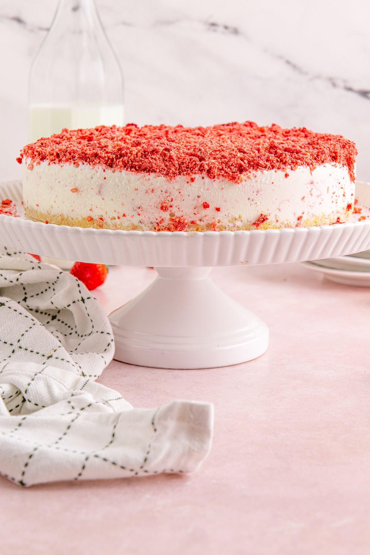 A strawberry shortcake ice cream cake with crumb topping.