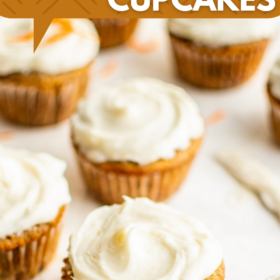Carrot Cake Cupcakes frosted with cream cheese frosting.