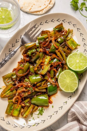 Chiles toreados on a plate.