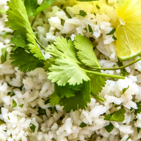 Rice with cilantro and fresh lime juice in a bowl.