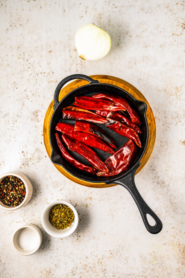 Toasting the chiles in a skillet.