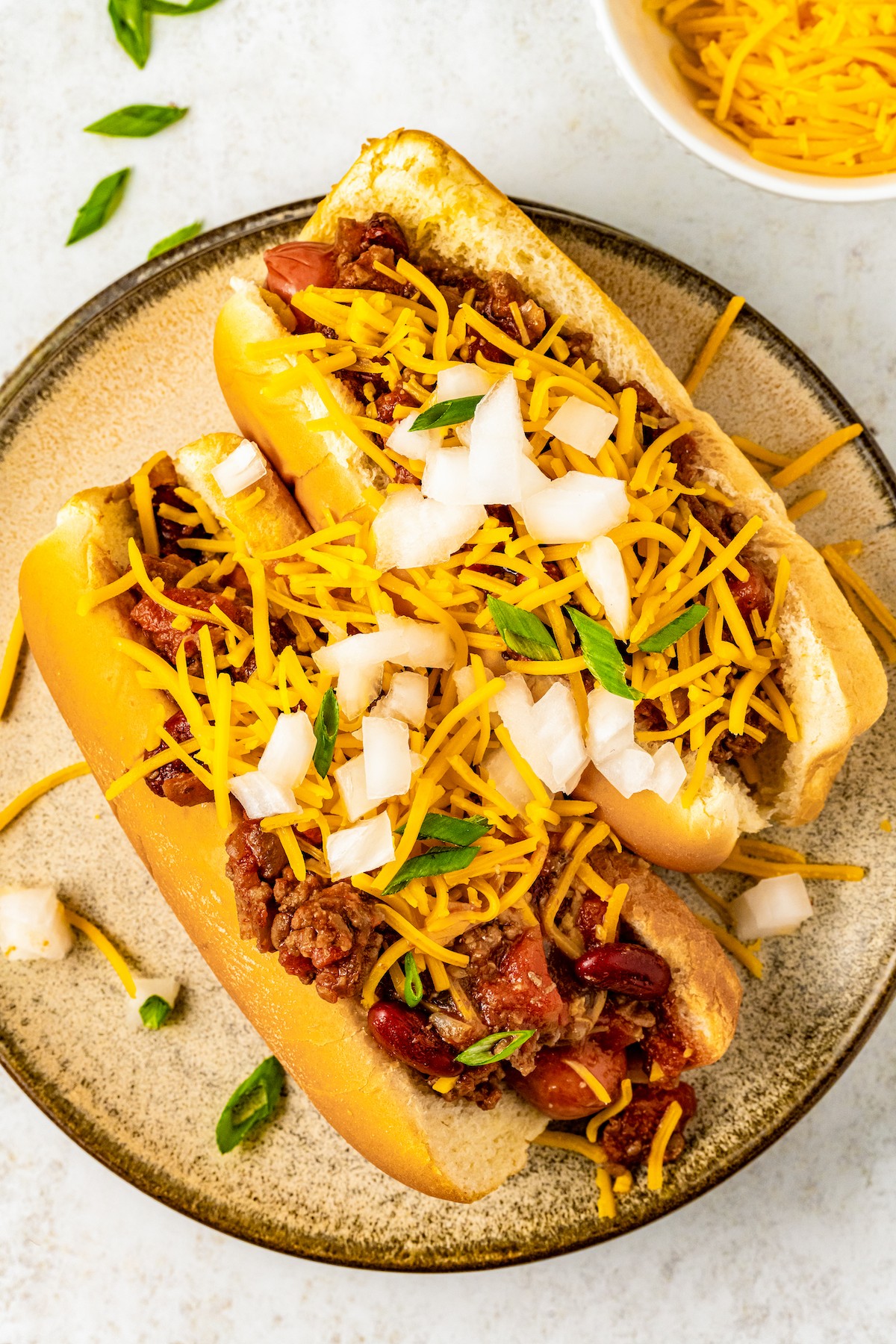 Overhead shot of hot dogs topped with homemade hot dog chili.
