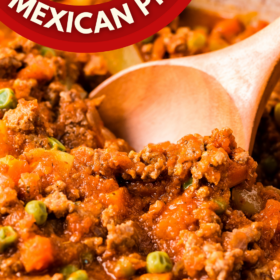 A wooden spoon scooping up a serving of Mexican Picadillo out of a bowl.
