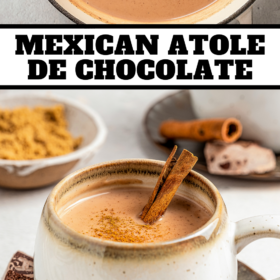 A cup of Atole de Chocolate with a cinnamon stick.