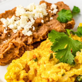 Huevos a la Mexicana on a plate with cilantro on top.