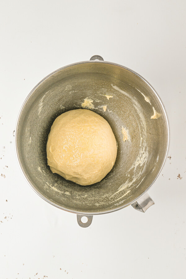 A ball of dough in a greased bowl.
