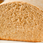 Landscape shot of a cut loaf of bread.