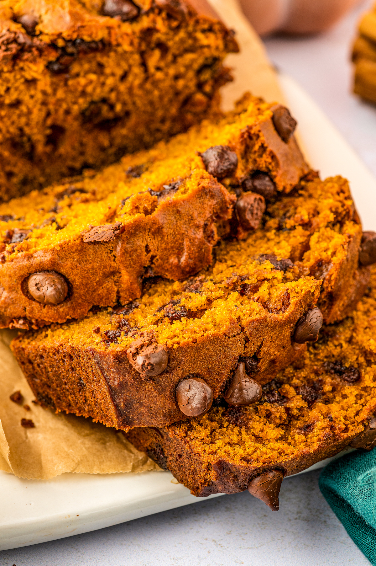 Sweet pumpkin bread with chocolate chips, cut into thick slices.