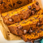 A chocolate chip quick bread with pumpkin, cut into slices.