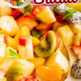 A bowl of Tropical Fruit Salad with fresh mint.