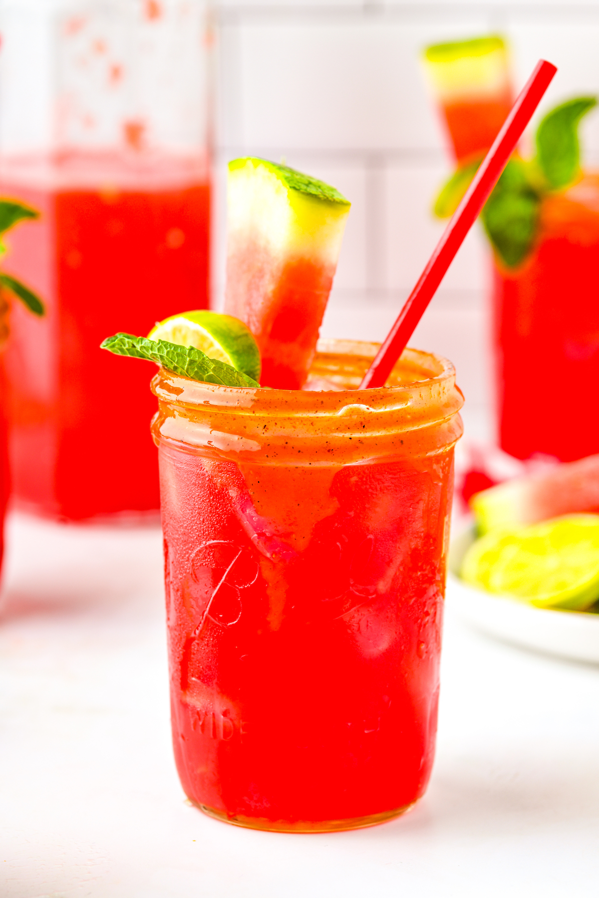 Side photo of a jar of watermelon agua fresca recipe. 