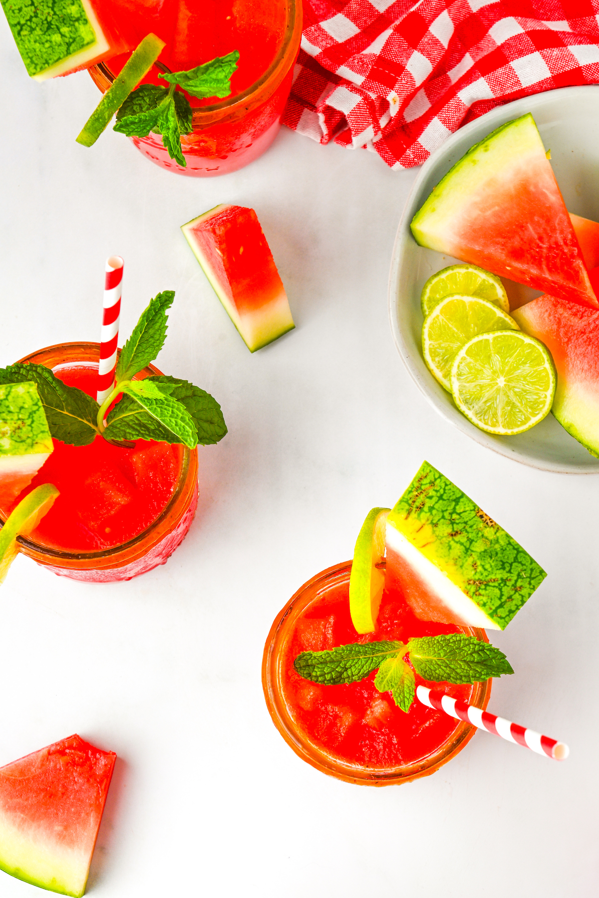 Overhead photo of two glasses of agua fresca with ice. 