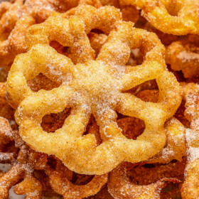 Close-up of a rosette-shaped Mexican fritter.