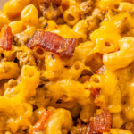 Landscape shot of cheeseburger macaroni with bacon bits.