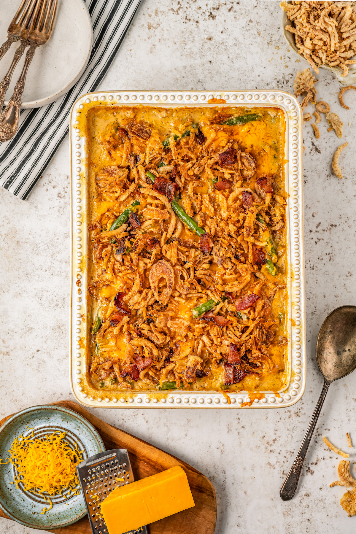 Baked green bean casserole with crispy onions.
