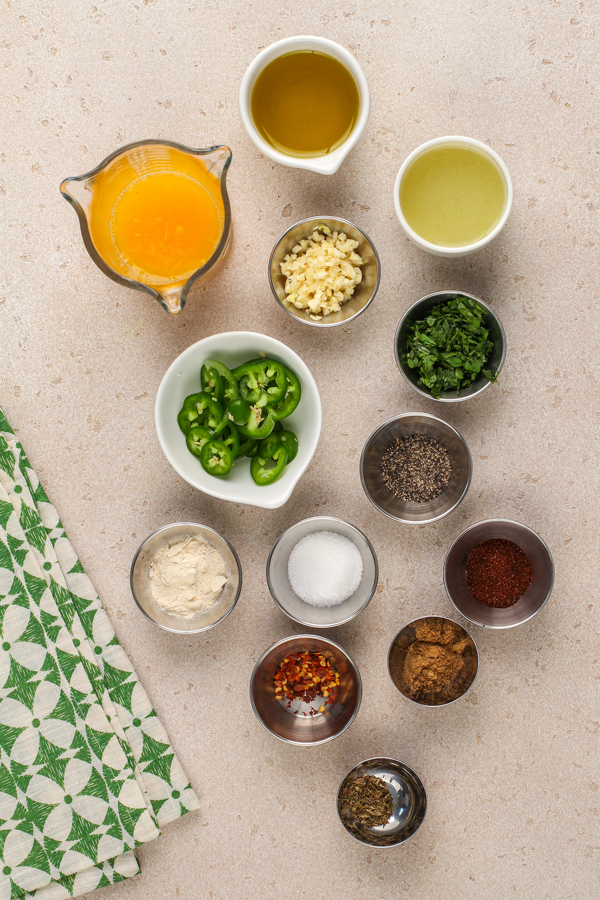 Ingredients for chicken fajita marinade, arranged on a table.