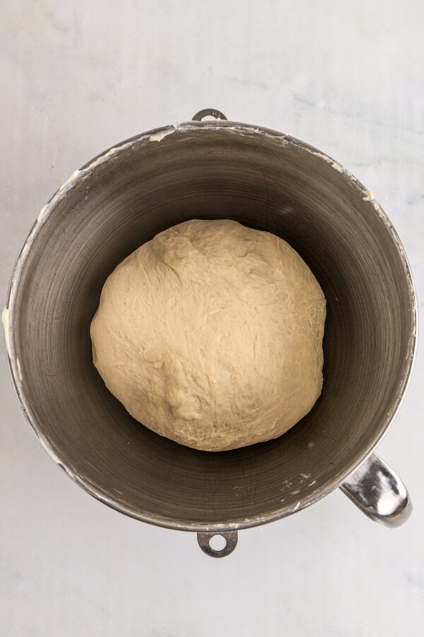 A ball of dough in a greased bowl