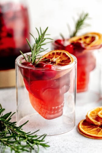 Halloween punch in a skull-shaped punch cup.