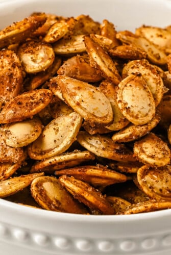 Close-up shot of smoky seasoned pumpkin seeds.