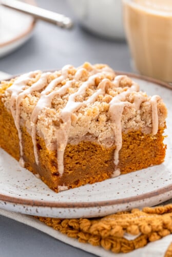 A square of coffee cake on a plate.