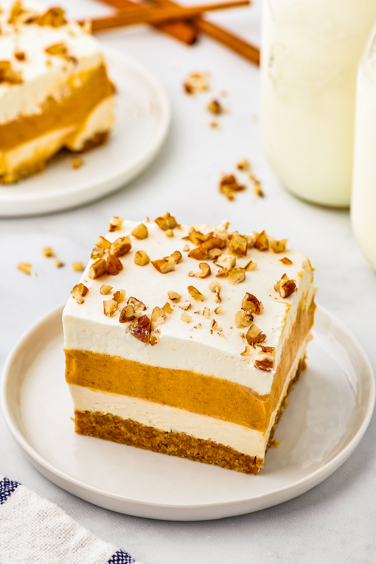 A square of pumpkin delight on a plate.