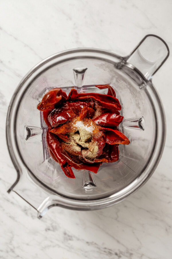 Chiles and seasonings in a blender.