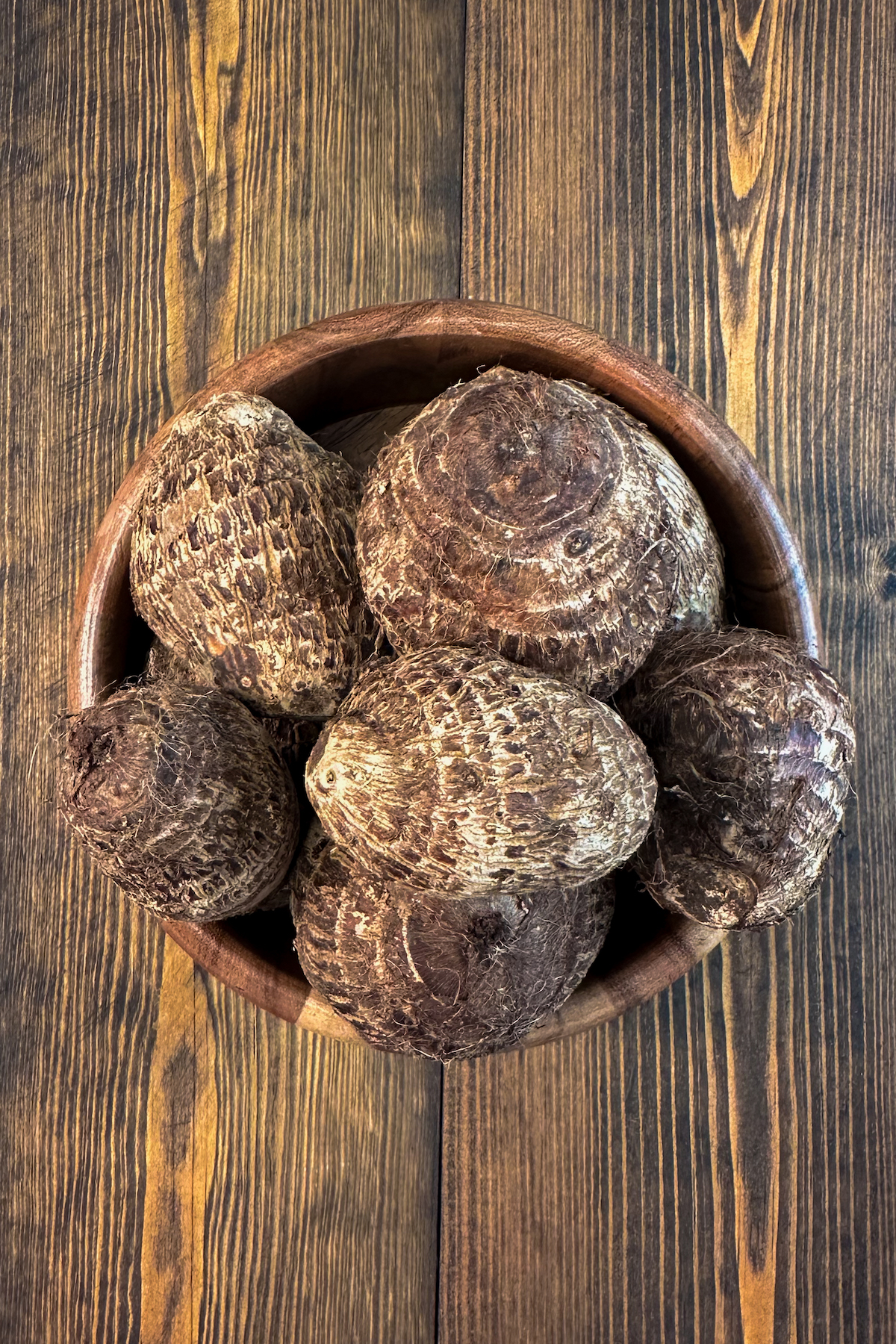 Taro Roots in a wooden bowl.