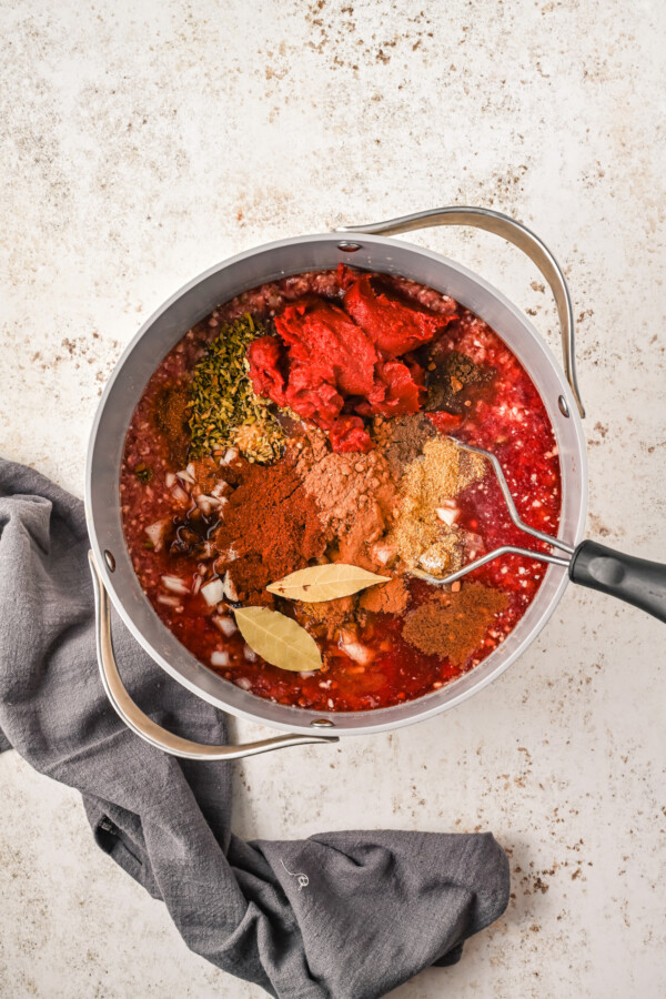 Chili ingredients in a saucepan.