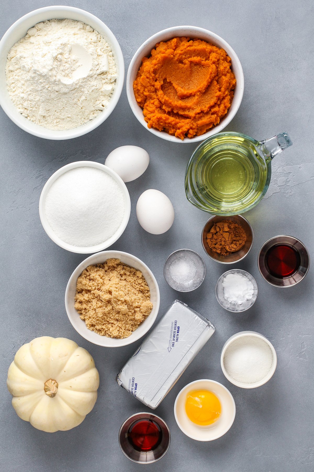 Ingredients arranged in bowls on a countertop.