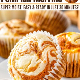 Pumpkin muffins with cream cheese swirled on top on a plate.
