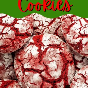 Red velvet crinkle cookies stacked on top of each other.
