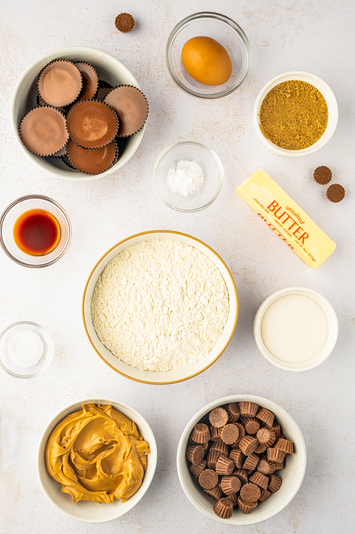 Ingredients for Reeses Cookies arranged in bowls.