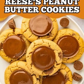 Peanut butter cookies with a full size Reese's peanut butter cup on top.