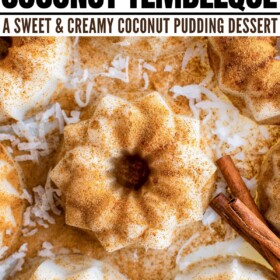 Coconut pudding on a platter with ground cinnamon on top.
