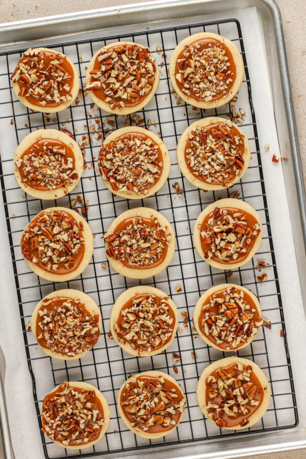 Sugar cookies topped with caramel and nuts become Turtle Cookies.