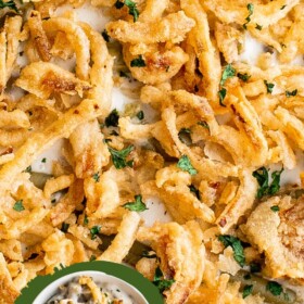 An easy green bean casserole with French fried onions on top.
