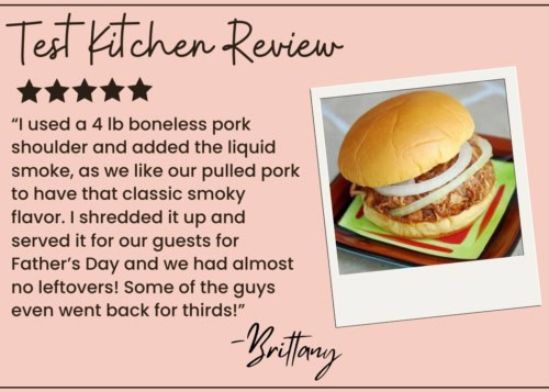 A review with five stars, a photo of crockpot pulled pork piled on a bun with onions, and a testimonial praising its smoky flavor and success at a Fathers Day gathering, signed “Brittany.”