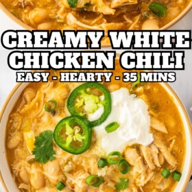 White chicken chili in a bowl with a spoon and sour cream on top.