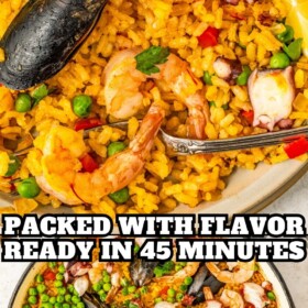 Seafood paella in a large pan and a serving on a plate with a fork taking a bite.