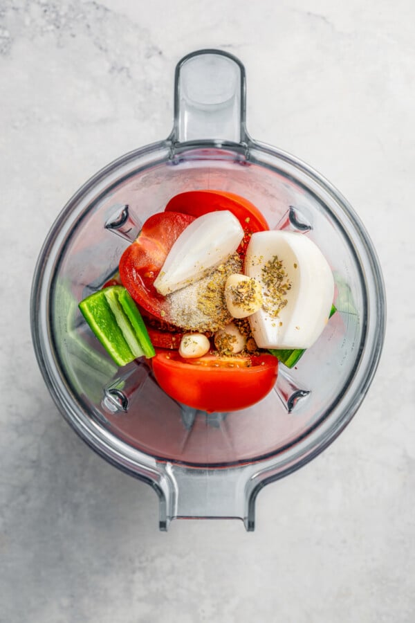 Ingredients for ranchero sauce in a blender before pureeing.