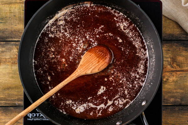 Cinnamon, brown sugar and butter being simmered together to create the sauce.