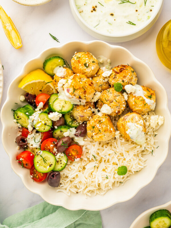 Bowl-style dinner with Greek chicken meatballs.
