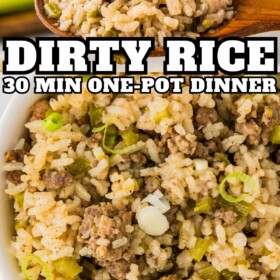 A wooden spoon scooping up a serving of dirty rice and a bowl of dirty rice with a fork in it.