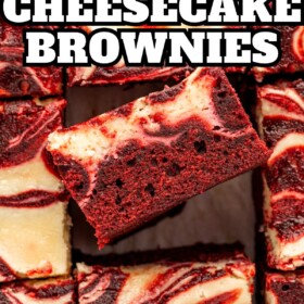 Red velvet brownies with a cheesecake swirl and a brownie turned on it's side to show the swirls.