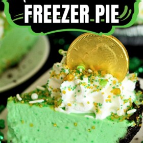 A slice of shamrock pie, a mint chocolate pie, topped with whipped cream and a chocolate coin.