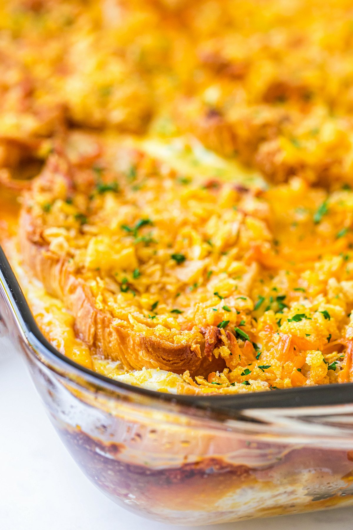 Ham and Cheese Breakfast Casserole with a crisp and buttery cornflake topping.