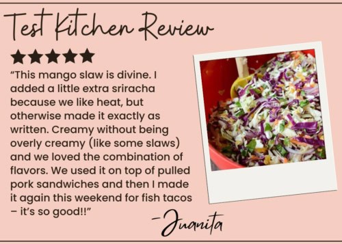 Mango Slaw earns a five-star rating for its refreshing taste and versatility. The photo shows vibrant Mango Slaw with cabbage and herbs in a red bowl. Highly recommended! —Juanita.